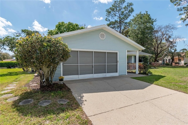 view of property exterior featuring driveway, a garage, and a lawn