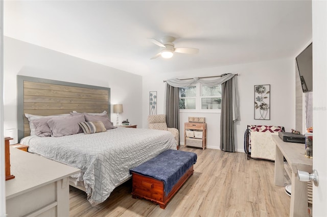 bedroom featuring ceiling fan and light wood-type flooring