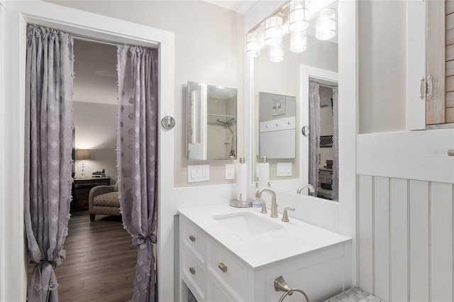 bathroom featuring wood-type flooring and vanity