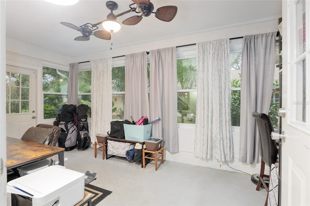 sunroom with ceiling fan