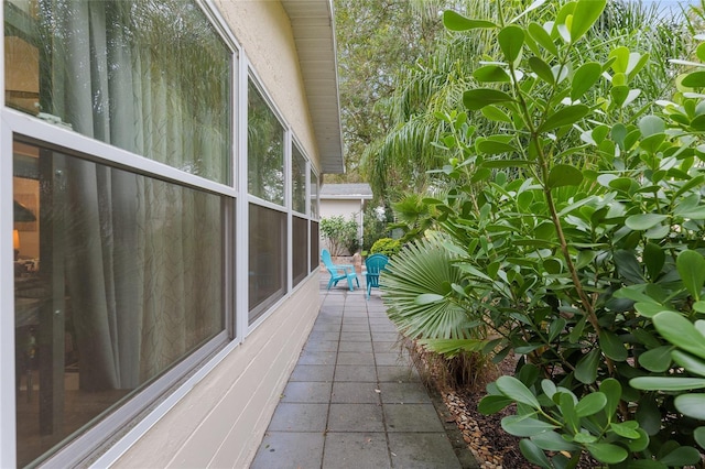 view of property exterior featuring a patio