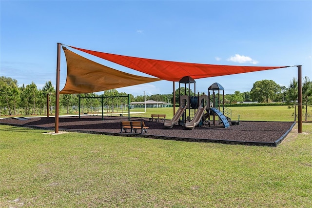 view of jungle gym featuring a yard