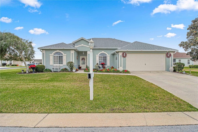 single story home with a garage and a front yard