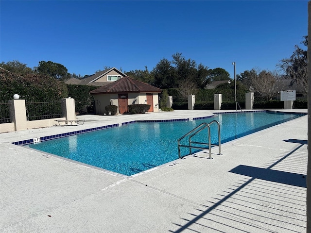 view of swimming pool featuring a patio