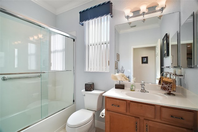 full bathroom featuring crown molding, a healthy amount of sunlight, toilet, and combined bath / shower with glass door