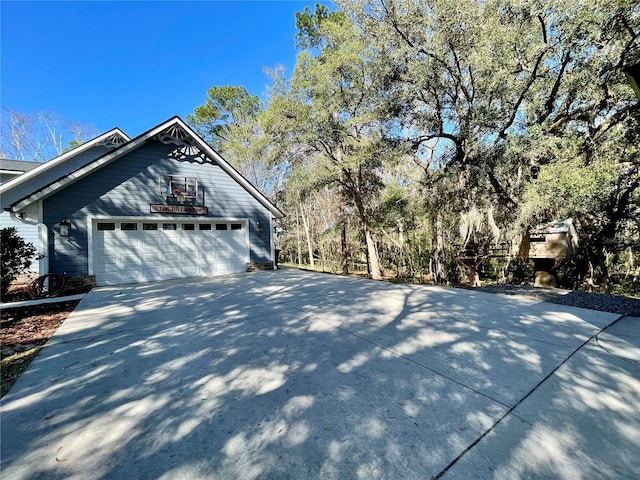 view of side of property featuring a garage