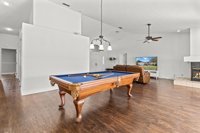 playroom featuring dark wood-type flooring, billiards, high vaulted ceiling, a tile fireplace, and ceiling fan