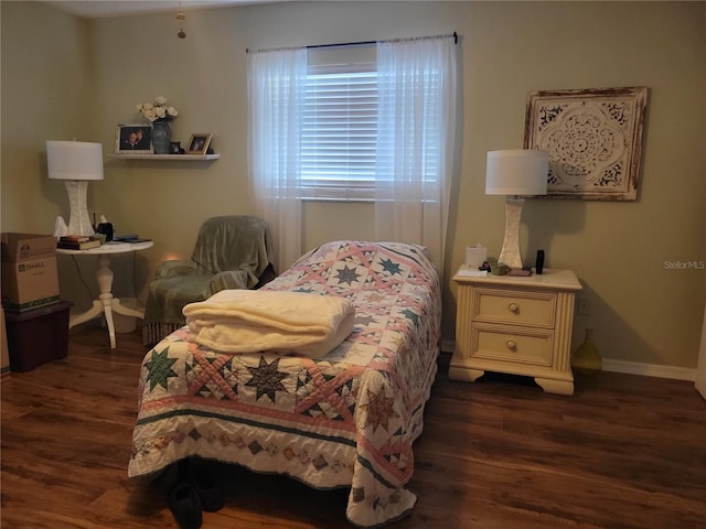 bedroom featuring dark hardwood / wood-style floors