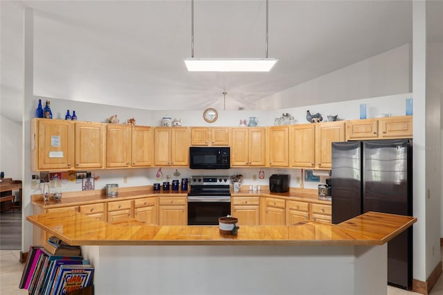 kitchen featuring a center island, light brown cabinets, and black appliances