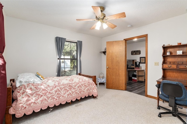 carpeted bedroom featuring ceiling fan