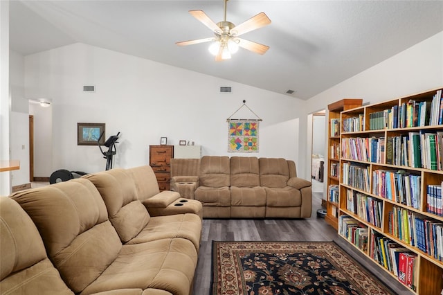 living room featuring ceiling fan, vaulted ceiling, and hardwood / wood-style floors