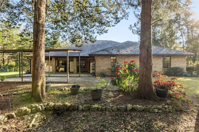 rear view of house with a patio