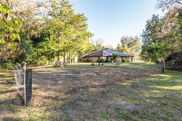 view of community featuring a yard