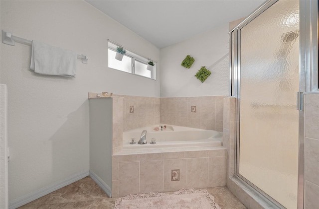 bathroom featuring independent shower and bath and tile patterned flooring