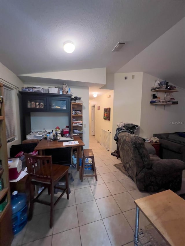 interior space featuring lofted ceiling