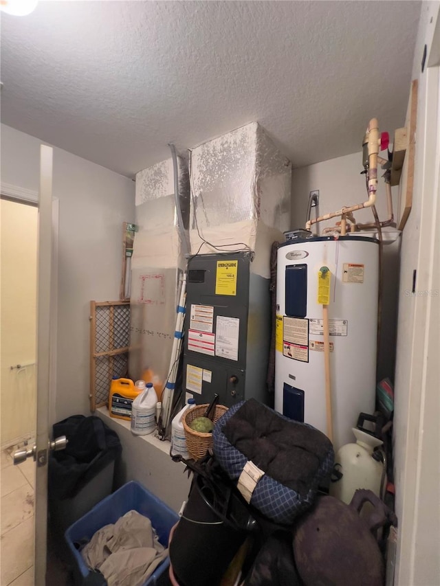 utility room with water heater