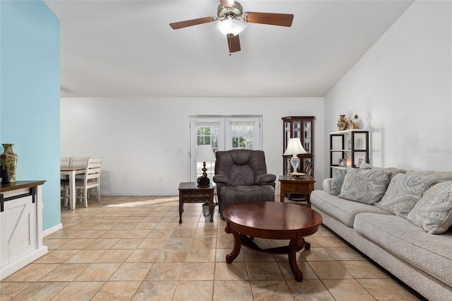 tiled living room featuring ceiling fan