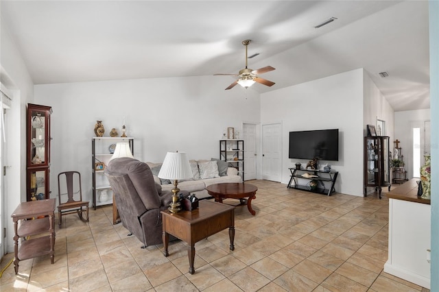 living room featuring vaulted ceiling and ceiling fan