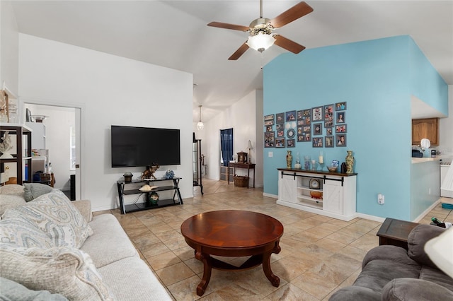 living room featuring indoor bar, vaulted ceiling, and ceiling fan