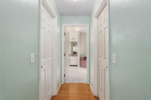 hall featuring light wood-type flooring