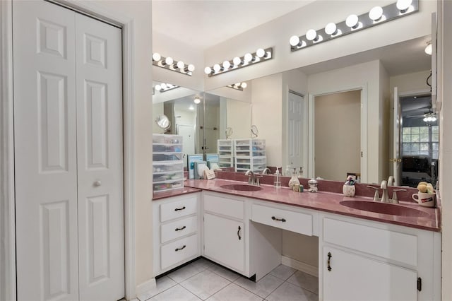 bathroom with vanity and tile patterned flooring