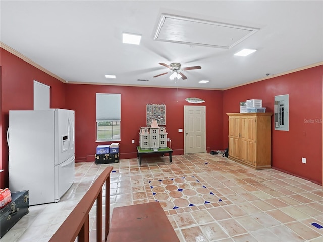 interior space featuring crown molding, ceiling fan, and white fridge with ice dispenser