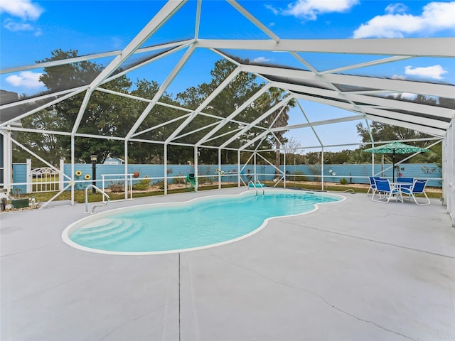 view of pool featuring a lanai and a patio area