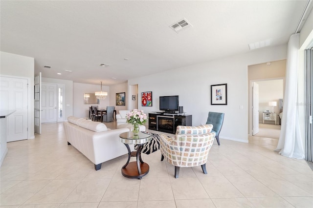 tiled living room with a textured ceiling