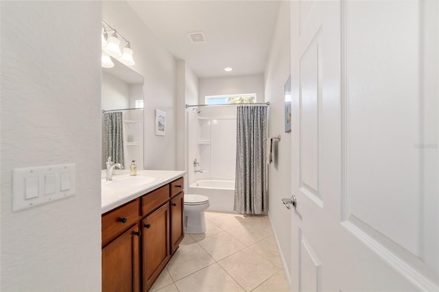 full bathroom with tile patterned flooring, vanity, shower / bathtub combination with curtain, and toilet