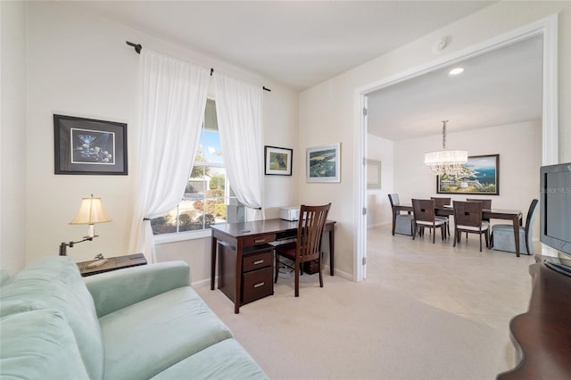 office area featuring light carpet and a notable chandelier