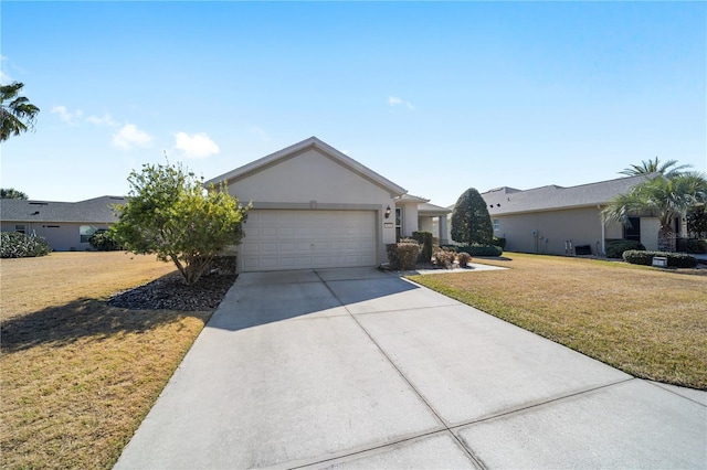 ranch-style home featuring a garage and a front yard