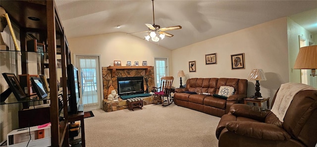 7651 SE 36th Ave, Ocala, FL 34480 - living area with a ceiling fan, a stone fireplace, carpet, and vaulted ceiling