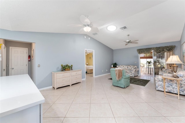 tiled living room featuring vaulted ceiling and ceiling fan