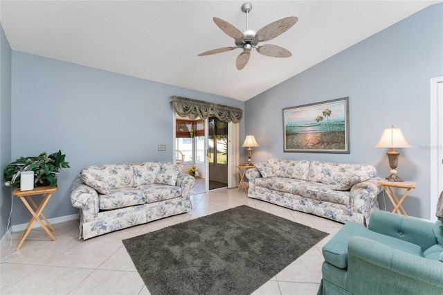 tiled living room with vaulted ceiling and ceiling fan