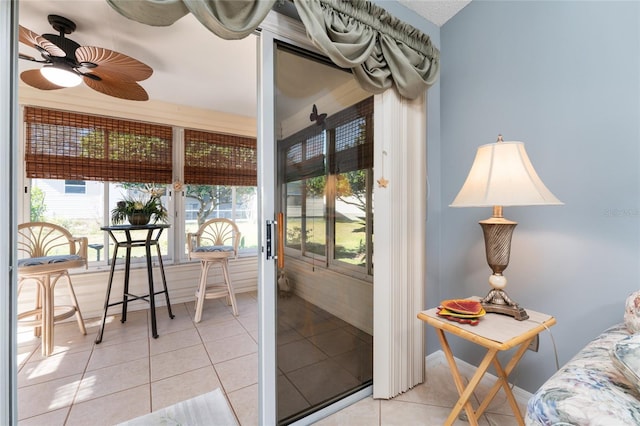 sunroom / solarium with ceiling fan