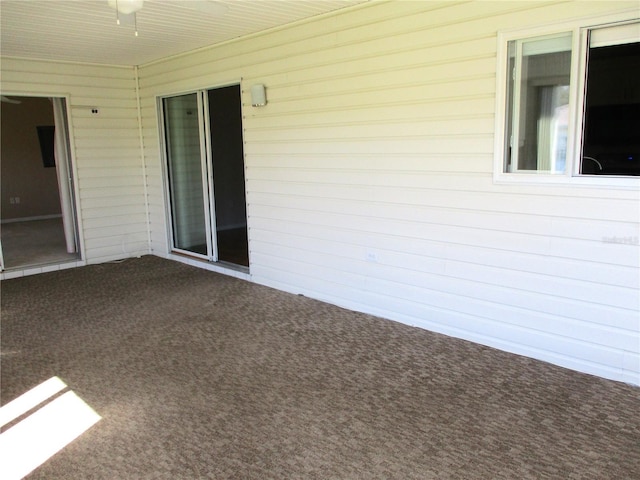 view of patio featuring a ceiling fan