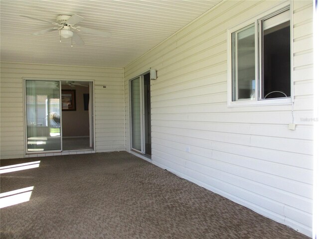 view of patio / terrace featuring ceiling fan