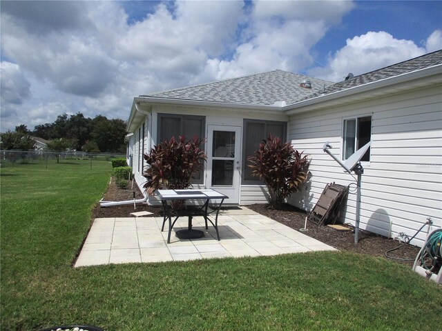 view of patio featuring fence