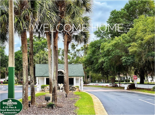 view of property's community with driveway