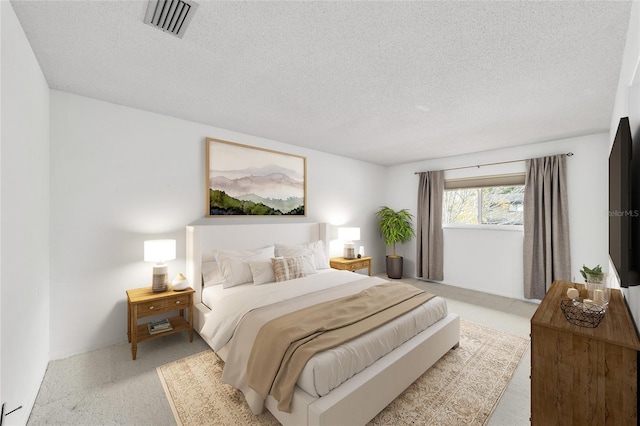 bedroom featuring a textured ceiling