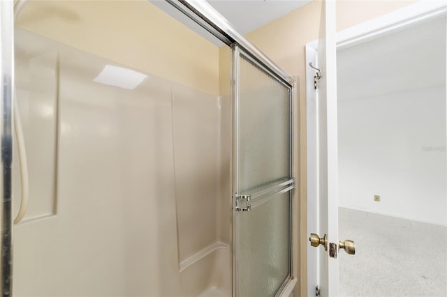 bathroom featuring walk in shower