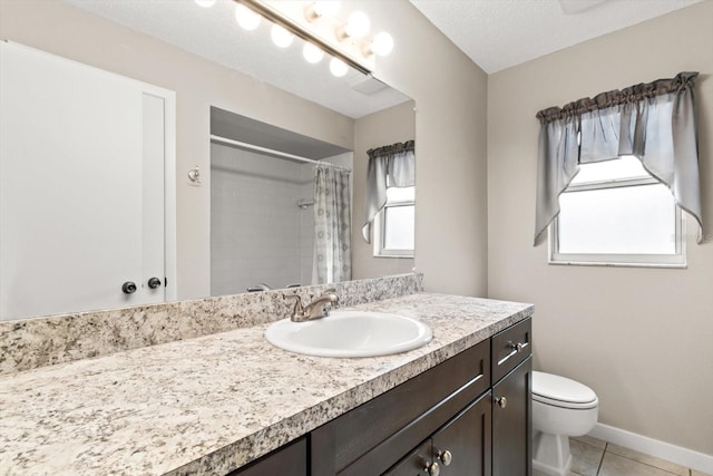 bathroom featuring toilet, a shower with curtain, a textured ceiling, vanity, and tile patterned flooring