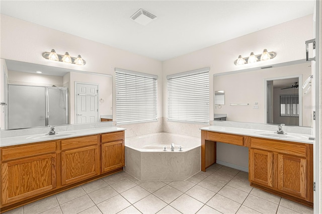 bathroom featuring vanity, tile patterned floors, and independent shower and bath