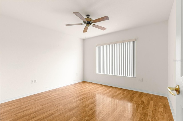 unfurnished room featuring ceiling fan and light wood-type flooring