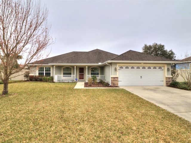 ranch-style home featuring a garage, a front yard, and a porch