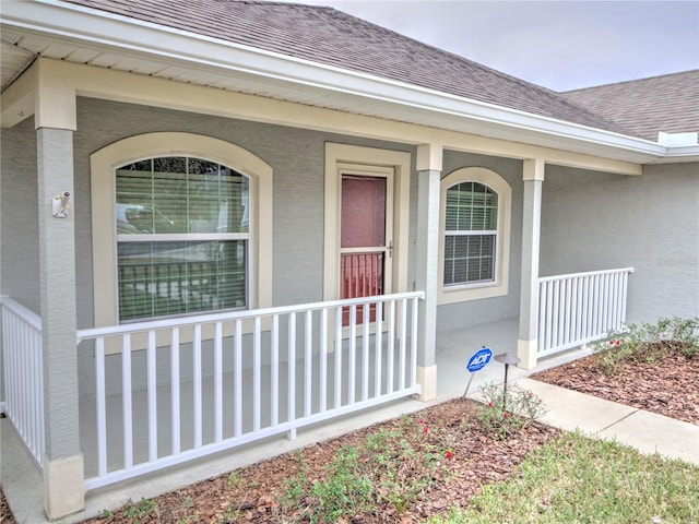 entrance to property with covered porch