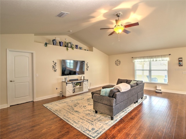 living room with vaulted ceiling, dark wood-type flooring, and ceiling fan