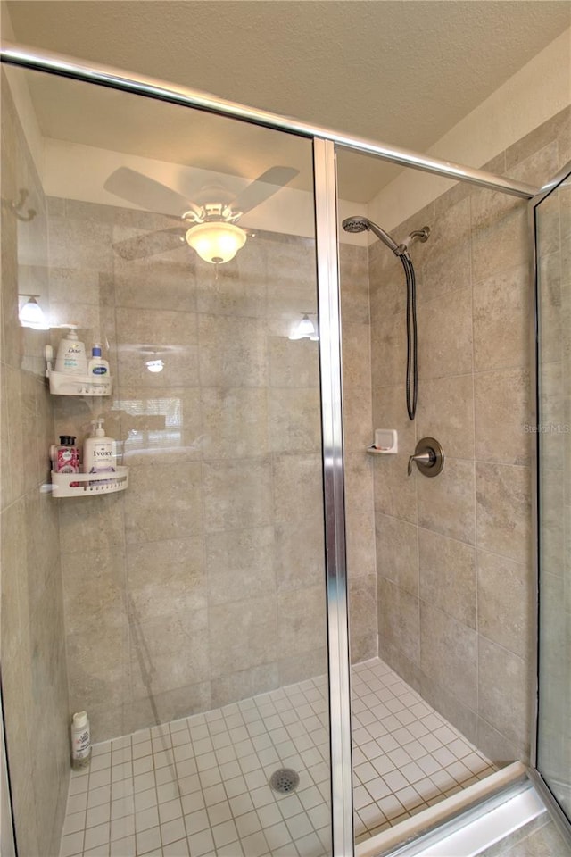 bathroom with a shower with shower door