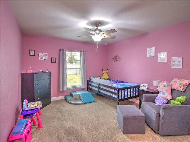 carpeted bedroom with ceiling fan