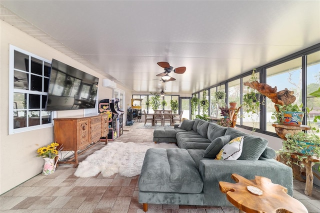 sunroom with ceiling fan